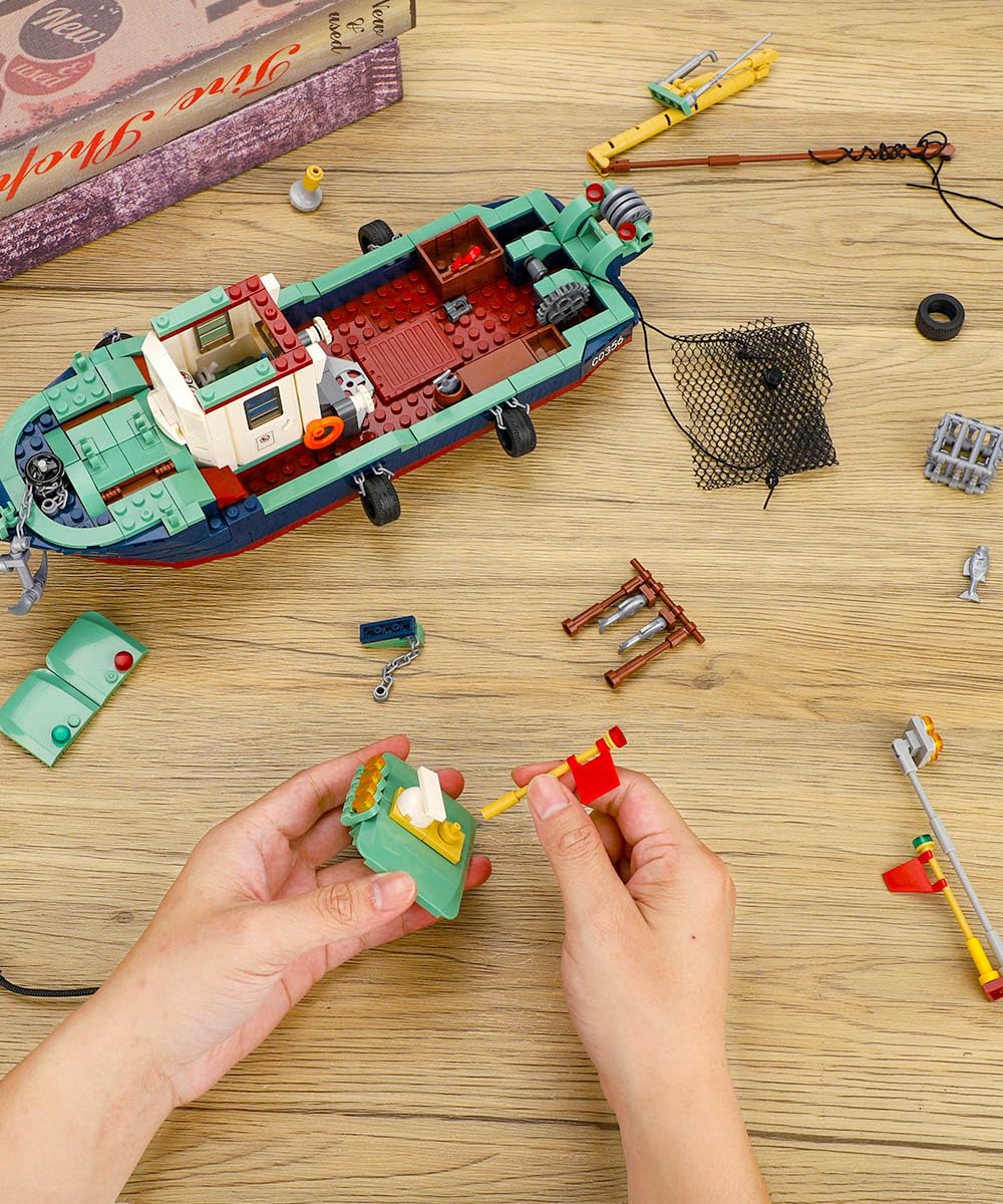 Mov Stone City Ocean fishing boat kit includes stickers and instructions for confident assembly