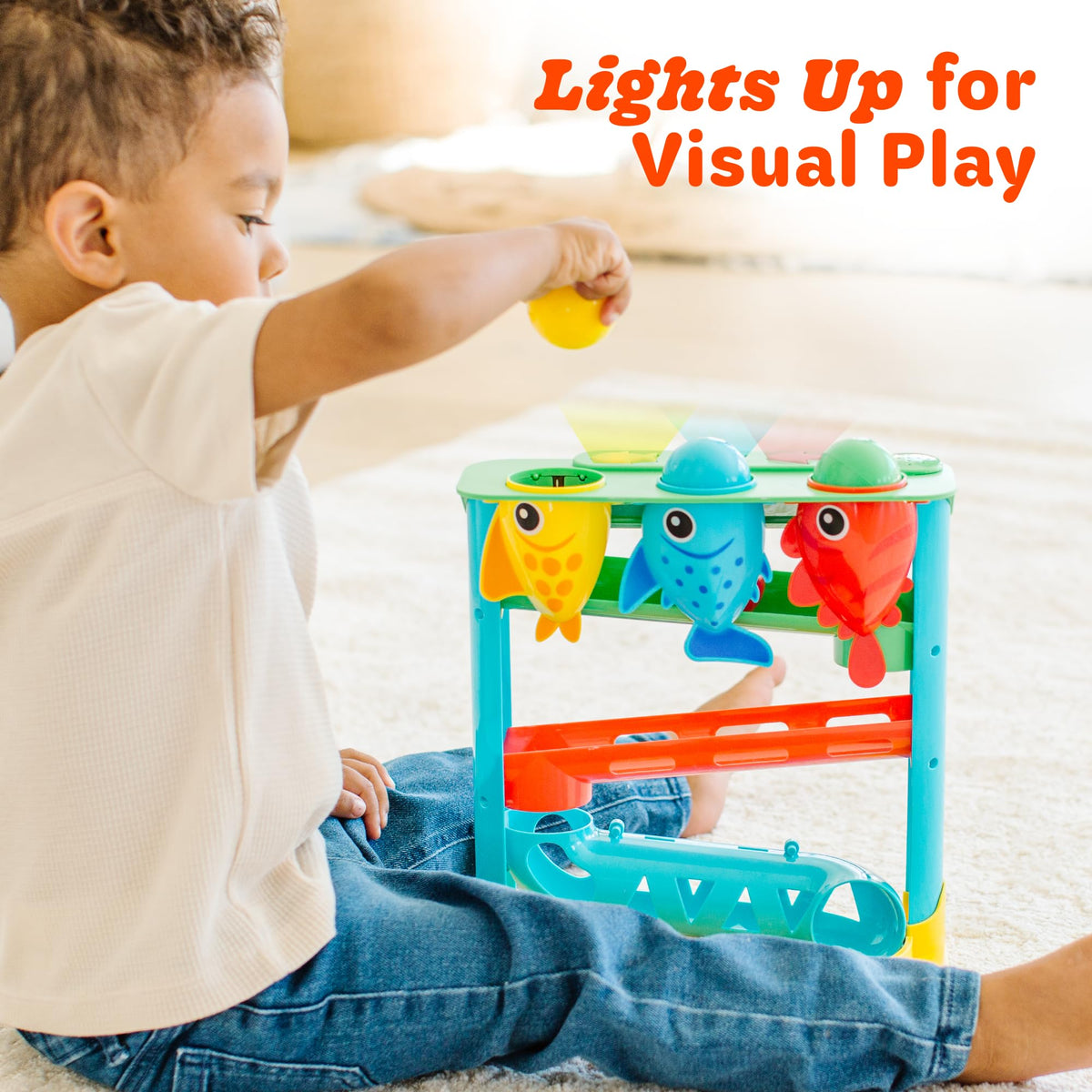 Move2Play Feed The Fish toy in a play area invites curious babies