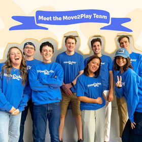Move2Play karaoke microphone party scene showing group singing.
