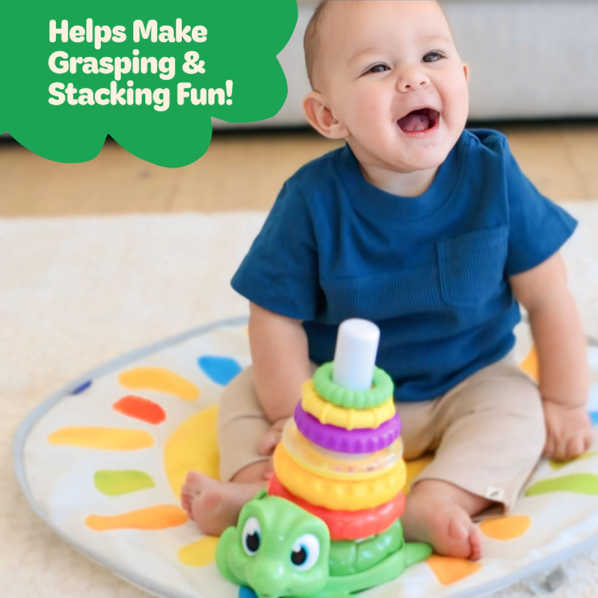 Move2Play Turtle Stacking Toy’s rattle ring adds sensory feedback during play.