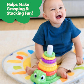 Move2Play Turtle Stacking Toy’s rattle ring adds sensory feedback during play.