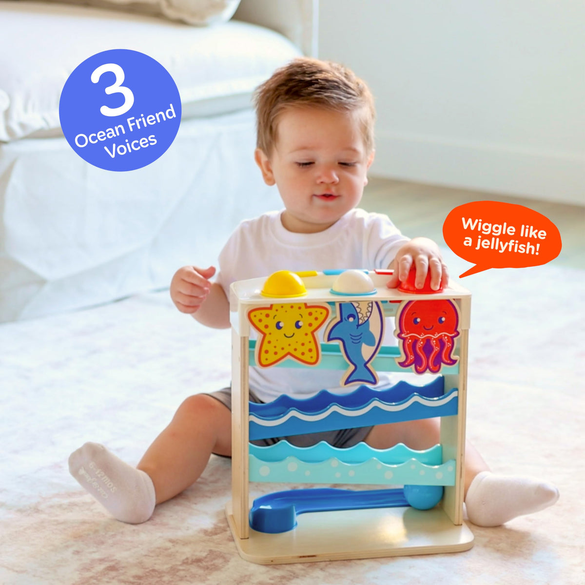 Move2Play Wooden Ocean Friends seas sounds and lights for sensory engagement.