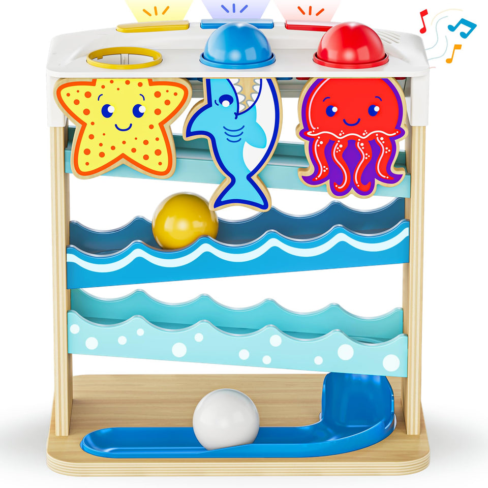 Move2Play Wooden Ocean Friends with three fish engaging babies in imaginative play.