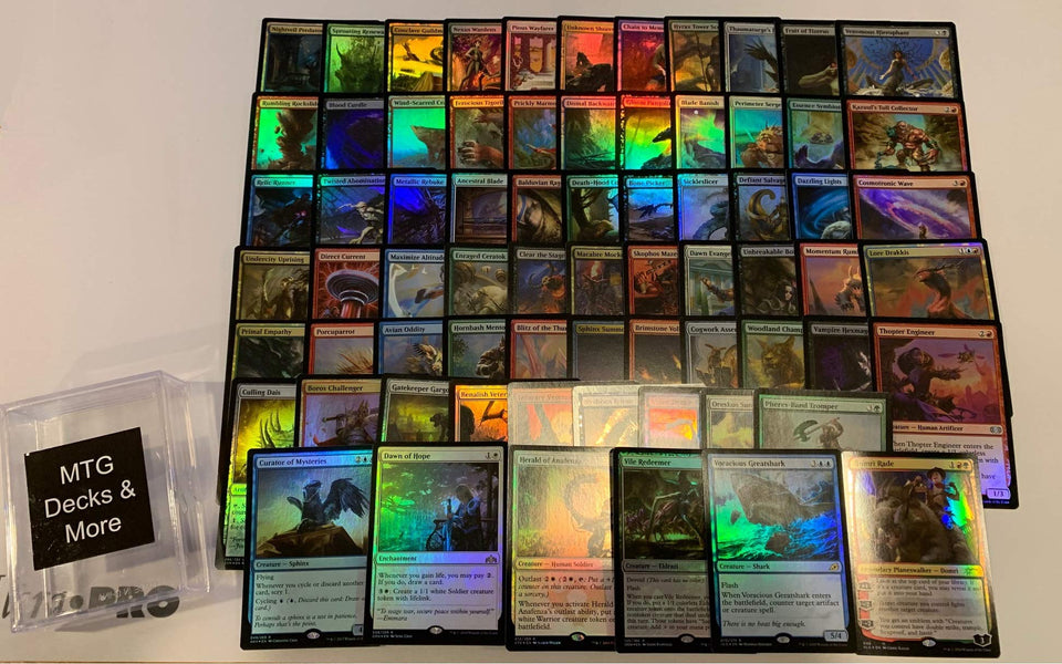 MTG Decks & More foil collection in protective box highlighting 1 planeswalker for trading and deck building