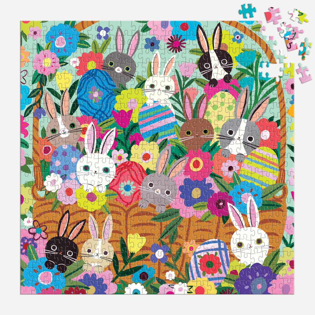 Mudpuppy Blooming Bunnies art on puzzle box, showcasing vibrant spring colors.
