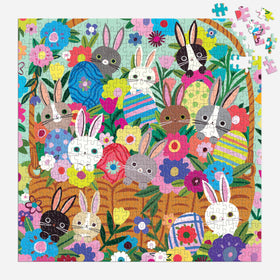 Mudpuppy Blooming Bunnies art on puzzle box, showcasing vibrant spring colors.