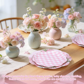 Mumufy 100-pack plates displayed together for events.