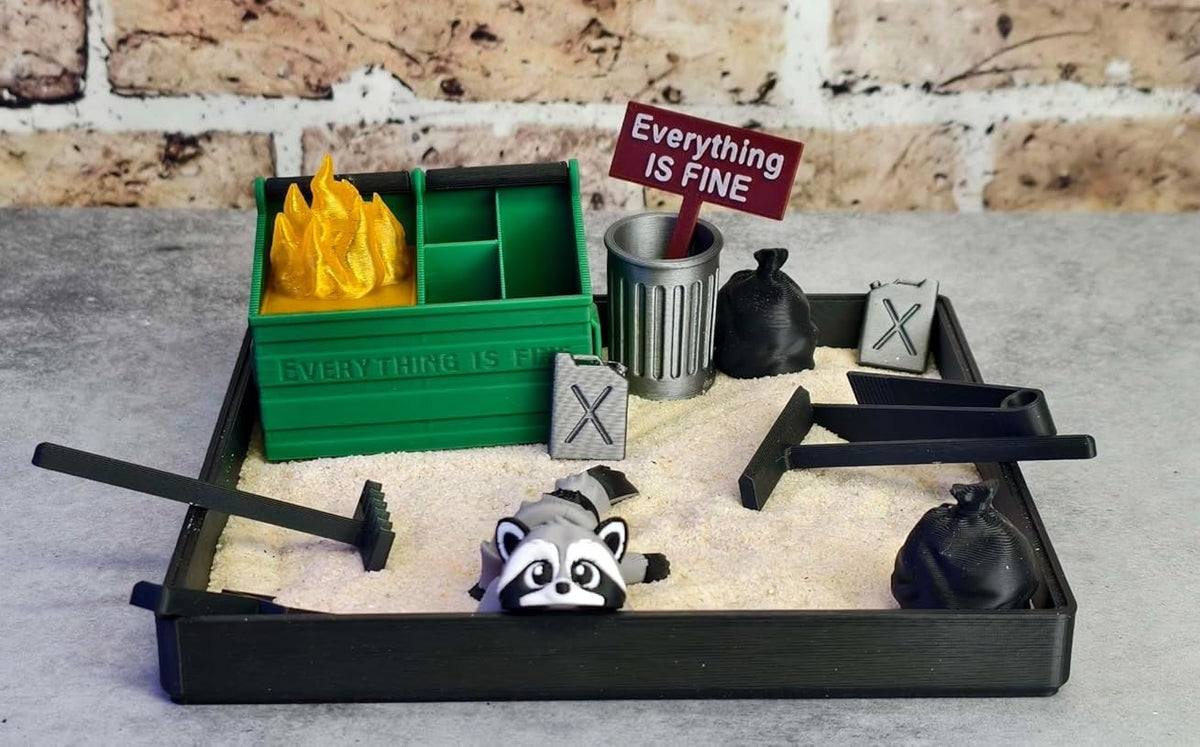 MunnyGrubbers Dumpster Fire Zen Garden base for calm desk focus.