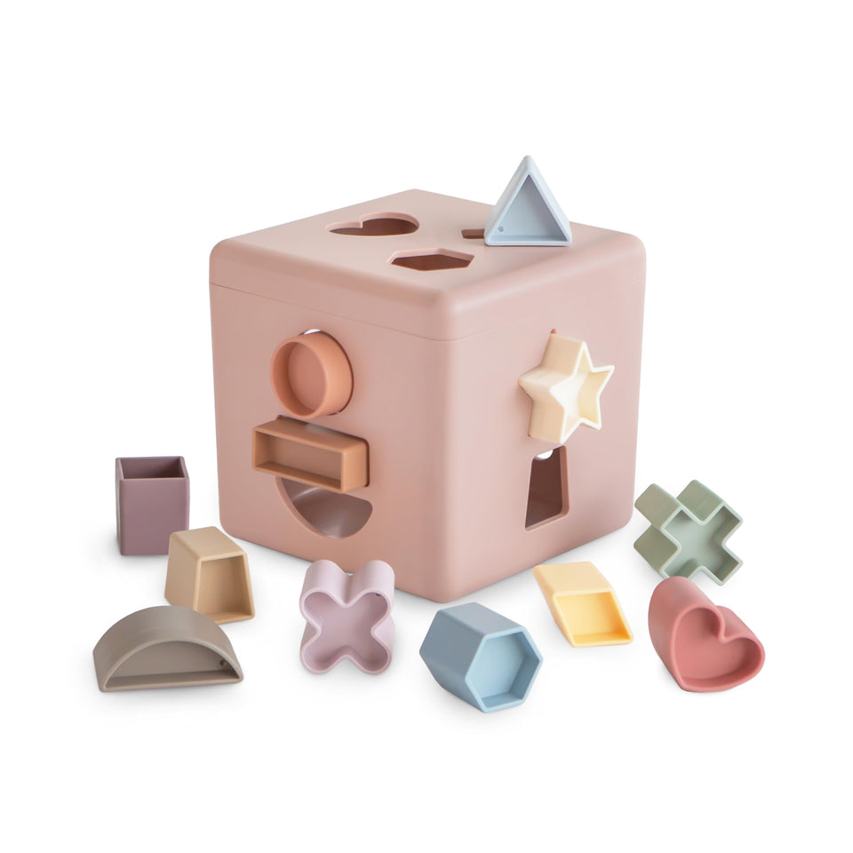 Mushie Shape Sorting Box Petal with closed lid for hands-on play