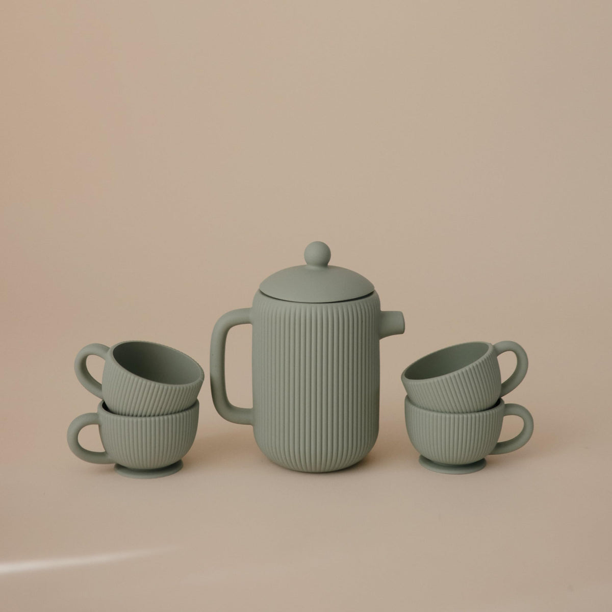Mushie teacup 1 soft grip silicone for little hands