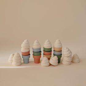 Mushie soft silicone pops for creative assembly playtime