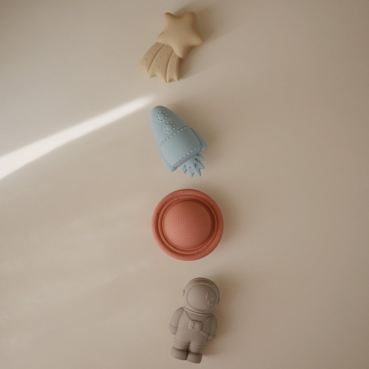 Mushie Space Bath Toys Rocket; perfect splashable companion for imaginative bathtime.