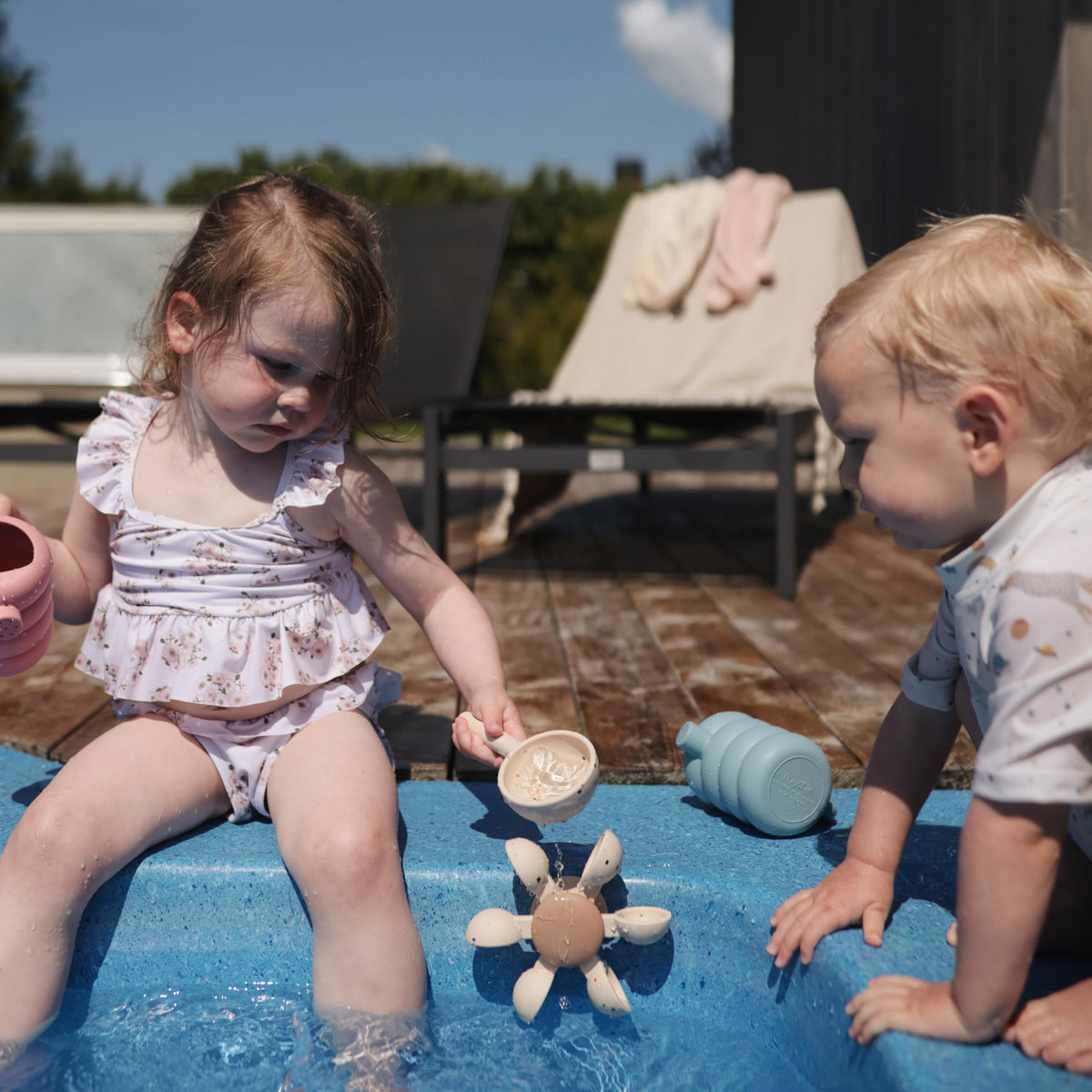 Mushie Water Wheel Toy suitable for ages 10 months plus sensory exploration.