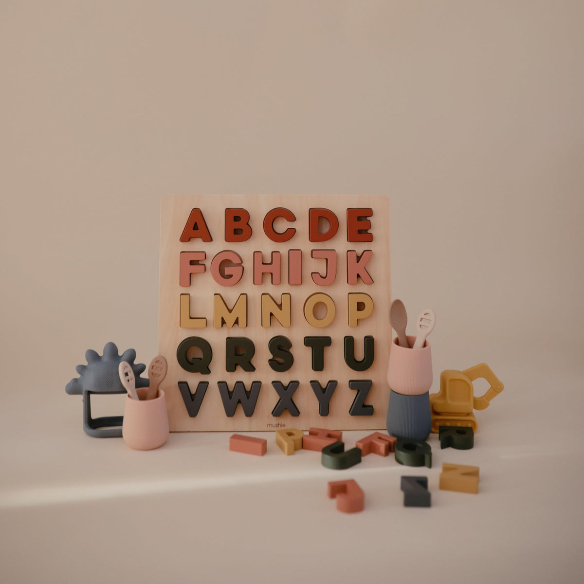Mushie alphabet puzzle measures 11.7 inches square for compact setup