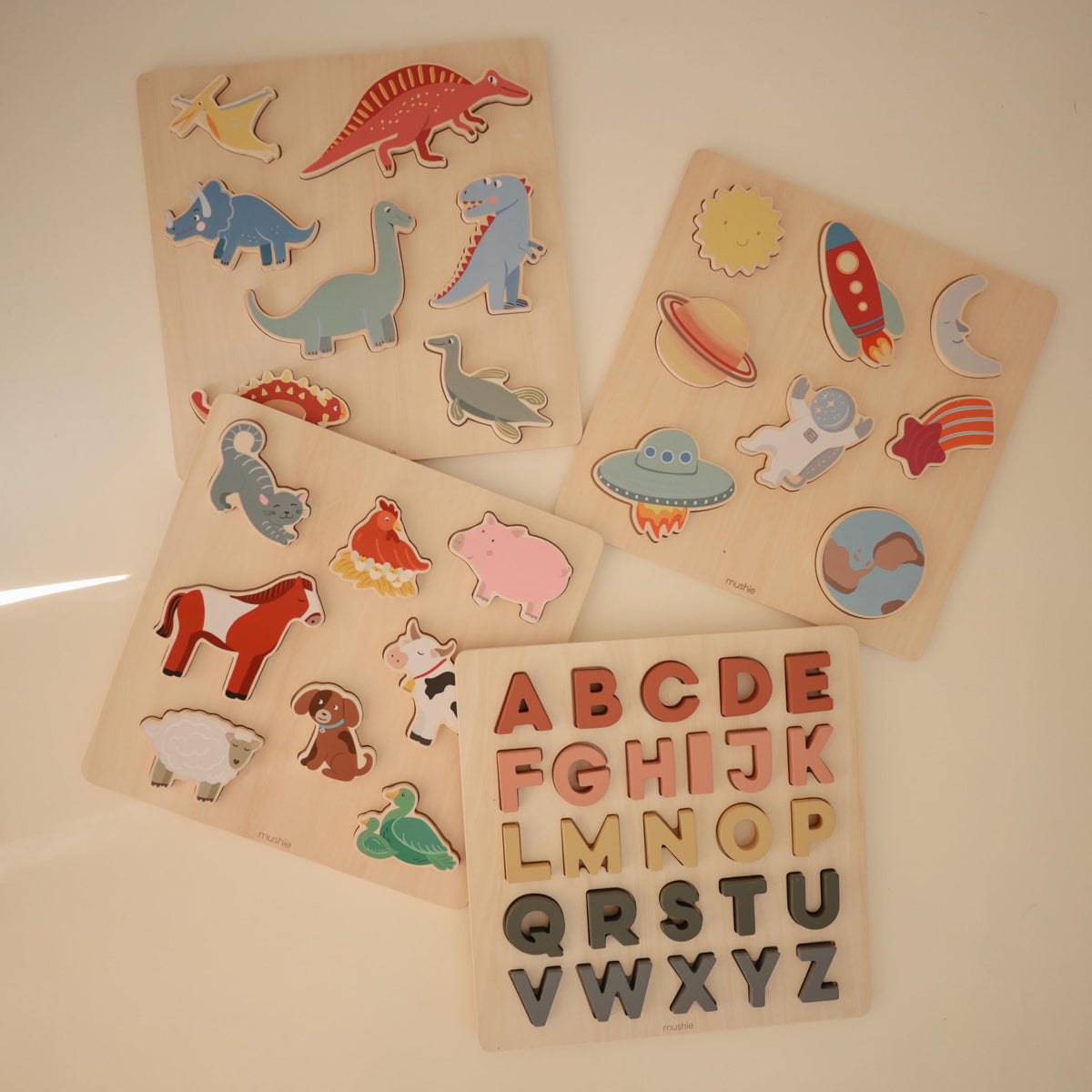 Mushie alphabet puzzle features rounded edges for safe toddler use