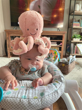 My Super Star pink octopus plush closeup face emphasizes non-toxic finish.