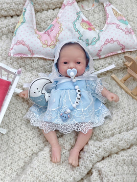 MYREBABY blue outfit doll detail highlights soft fabric for gentle storytelling.