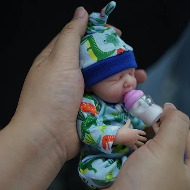 MYREBABY Eric with pacifier and bottle for nurturing play.