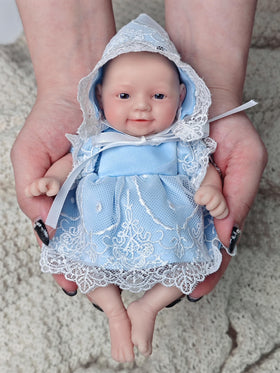 MYREBABY silicone full-body doll close-up shows realistic skin texture.