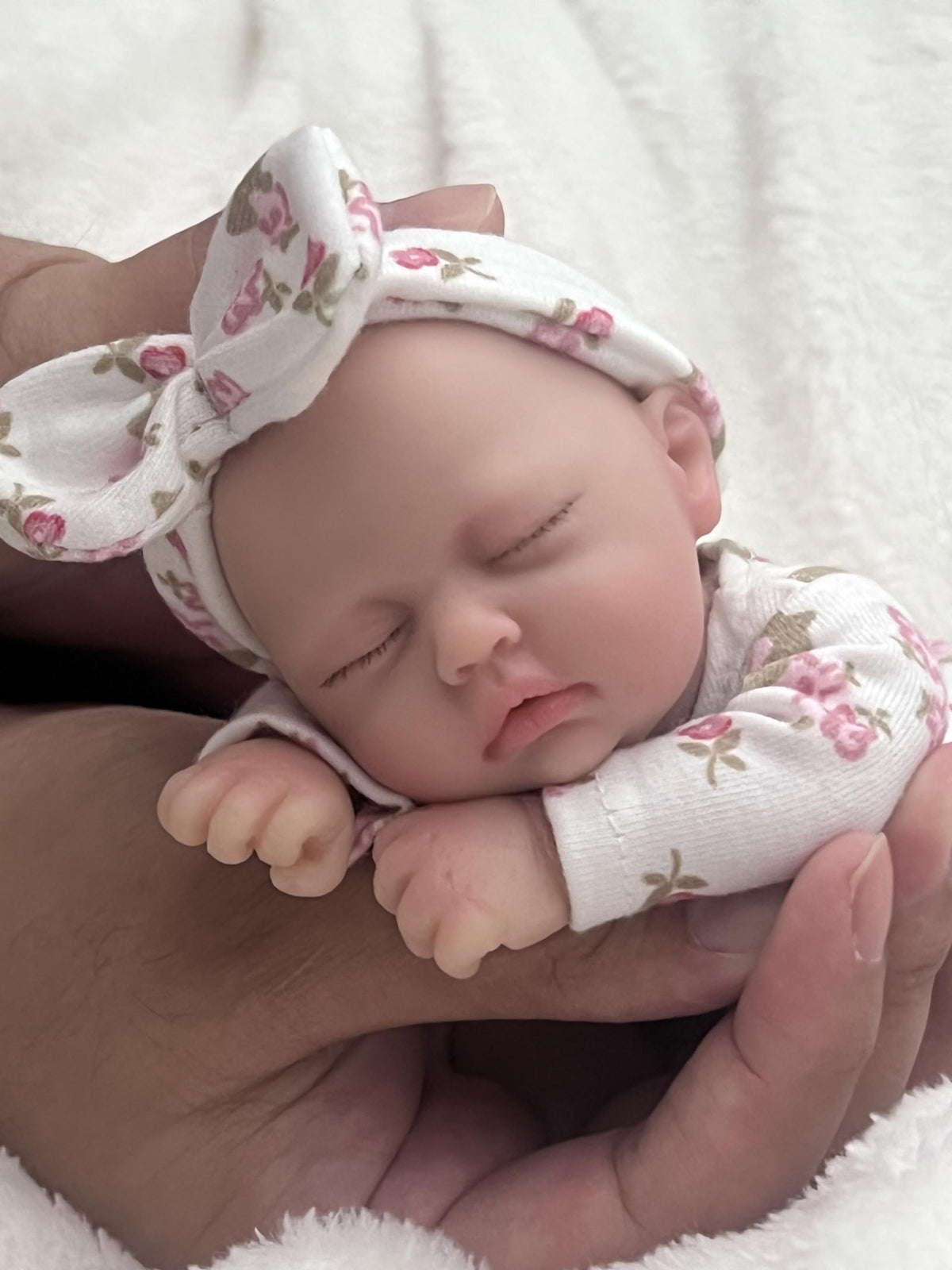 Close-up of MYREBABY silicone skin texture showing soft realism for comforting play.