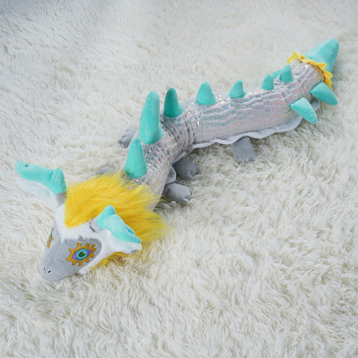 Nadou TLOZ Light Dragon plush fabric close-up highlighting soft plush texture