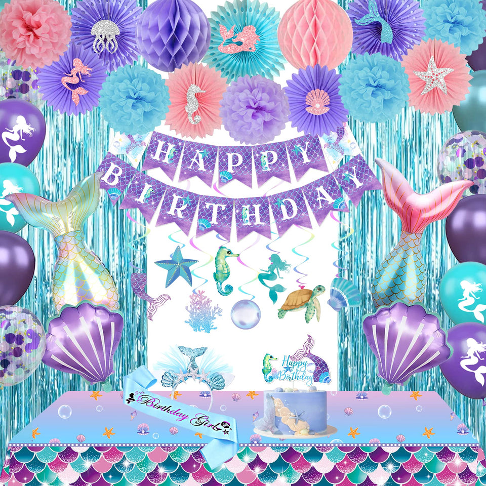 Nalyee mermaid banner hanging over the party space for a magical undersea vibe.