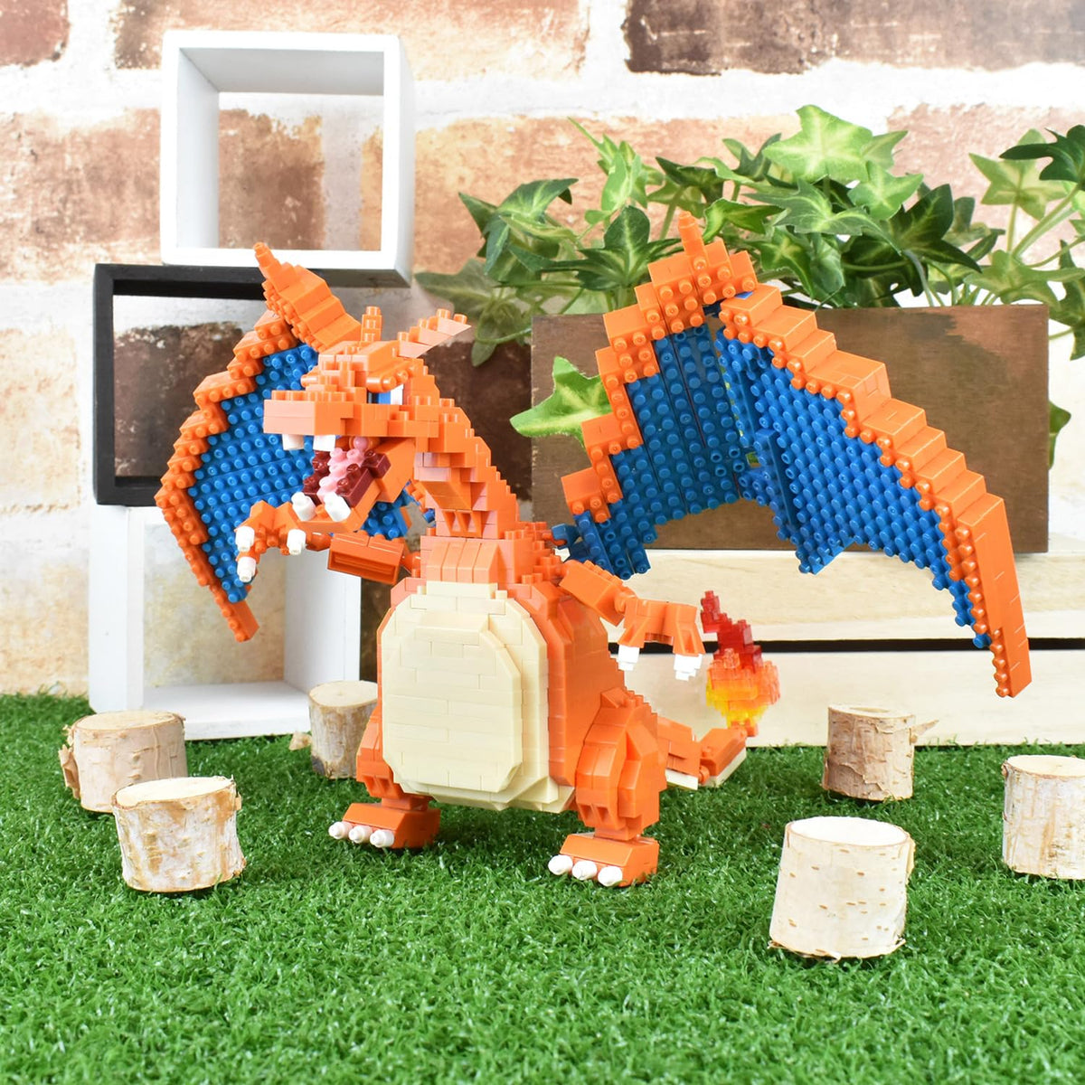 Nanoblock Charizard Deluxe Edition box with Bandai Namco label confirms licensing.