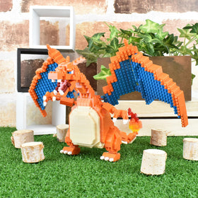 Nanoblock Charizard Deluxe Edition box with Bandai Namco label confirms licensing.