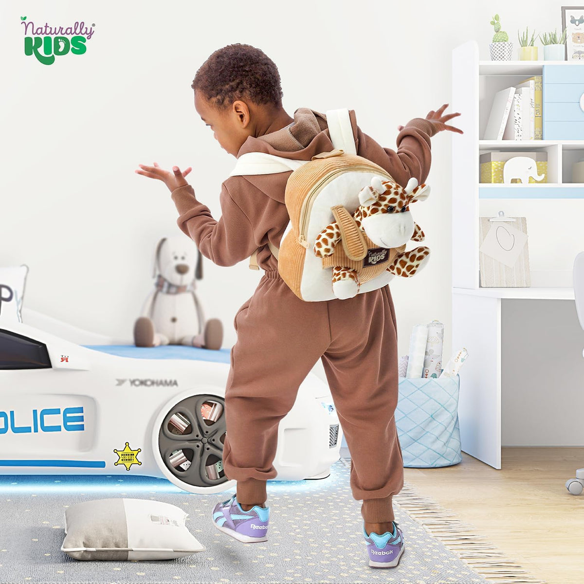 Naturally KIDS Giraffe Backpack showing removable plush toy for free play
