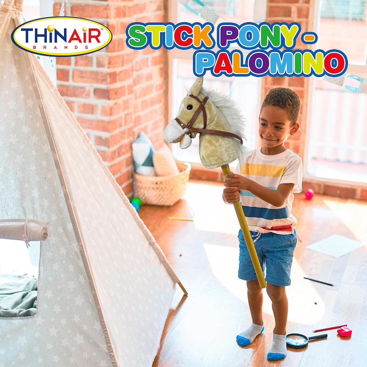 Nature Bound child playing with stick horse during active pretend play.