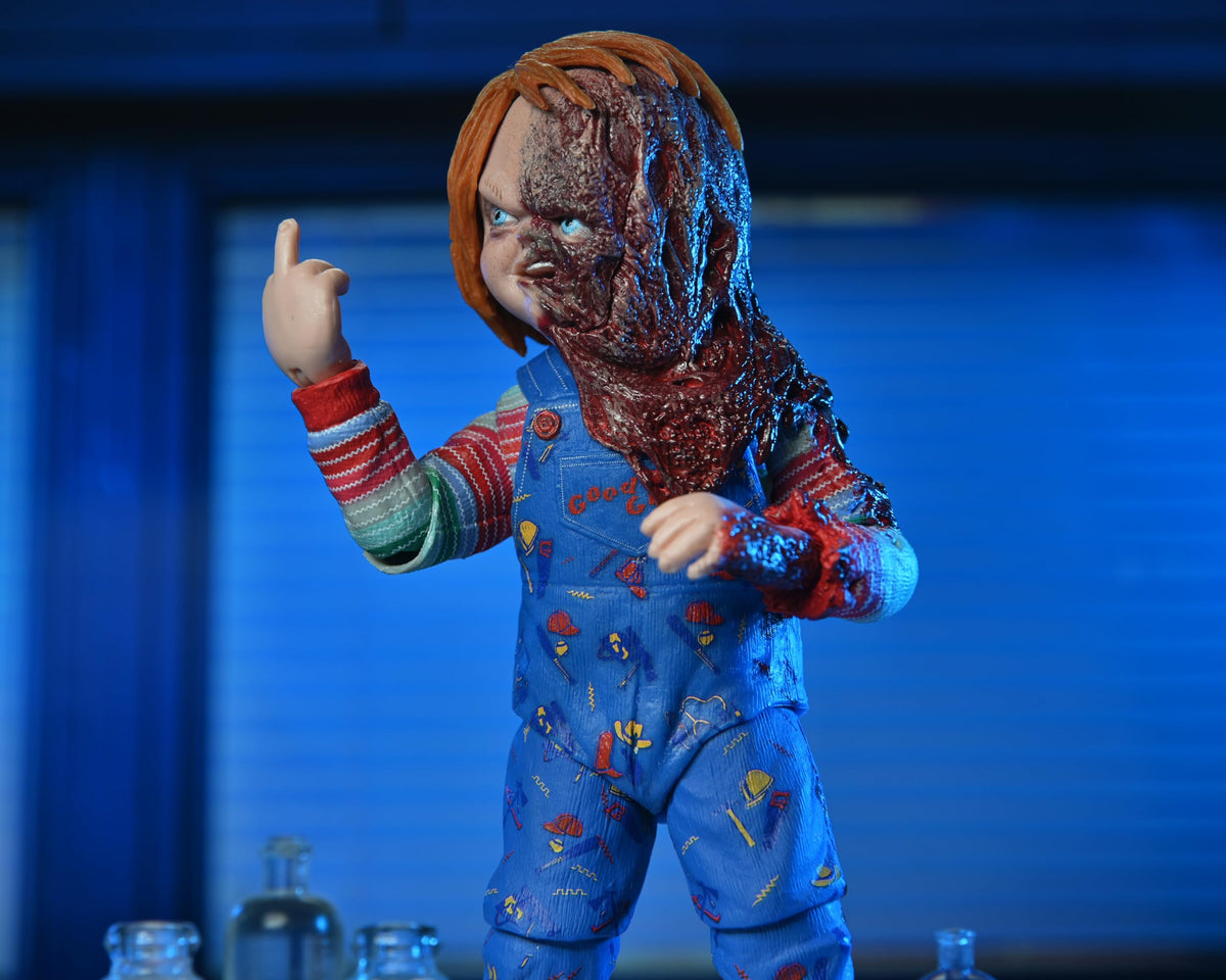 NECA Chucky burnt-arm accessory adds eerie battle-damage detail