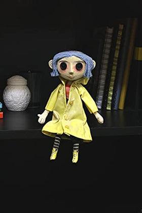 NECA Coraline doll showing hidden armature for posing arms and legs