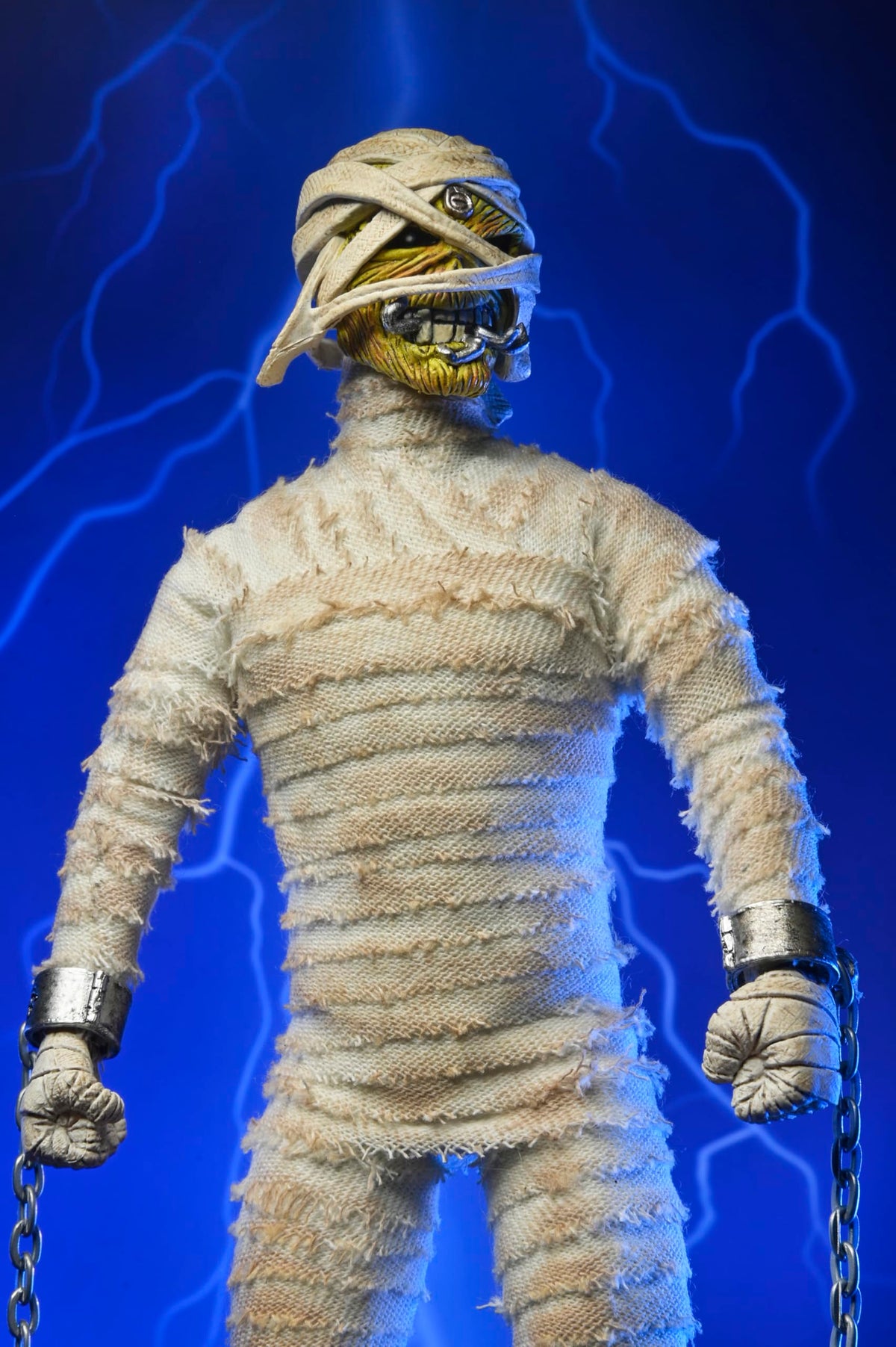 NECA Iron Maiden Mummy Eddie 8in clothed fabric texture enhances realism.