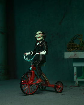 NECA Billy puppet with Trike completes the collectible display narrative.
