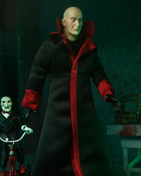 NECA pig-mask accessory adds authentic detail for Jigsaw display scenes.