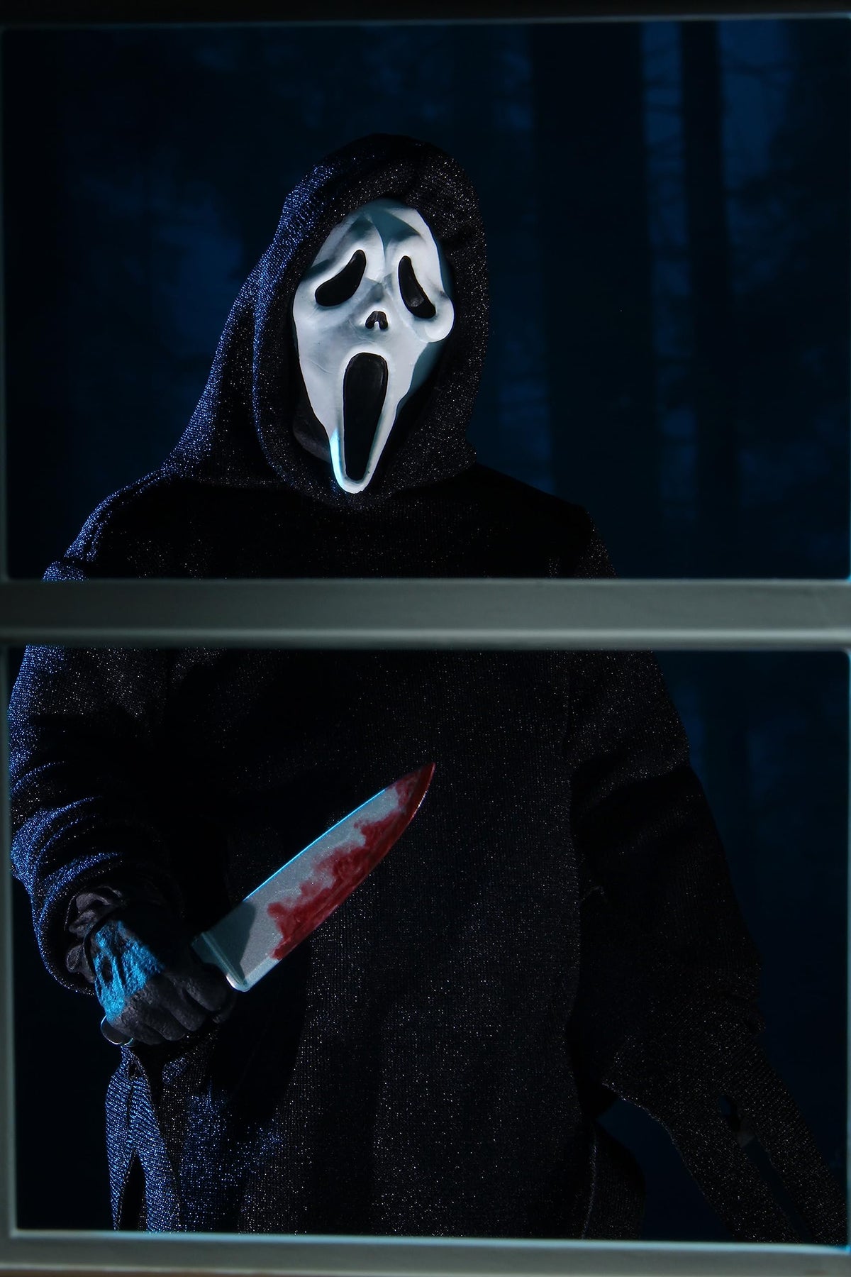 NECA Ghost Face figure with scythe accessory for detailed display