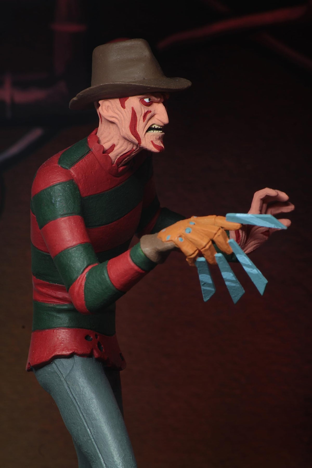 NECA Toony Terrors Freddy Krueger fedora accessory adds authentic flair.