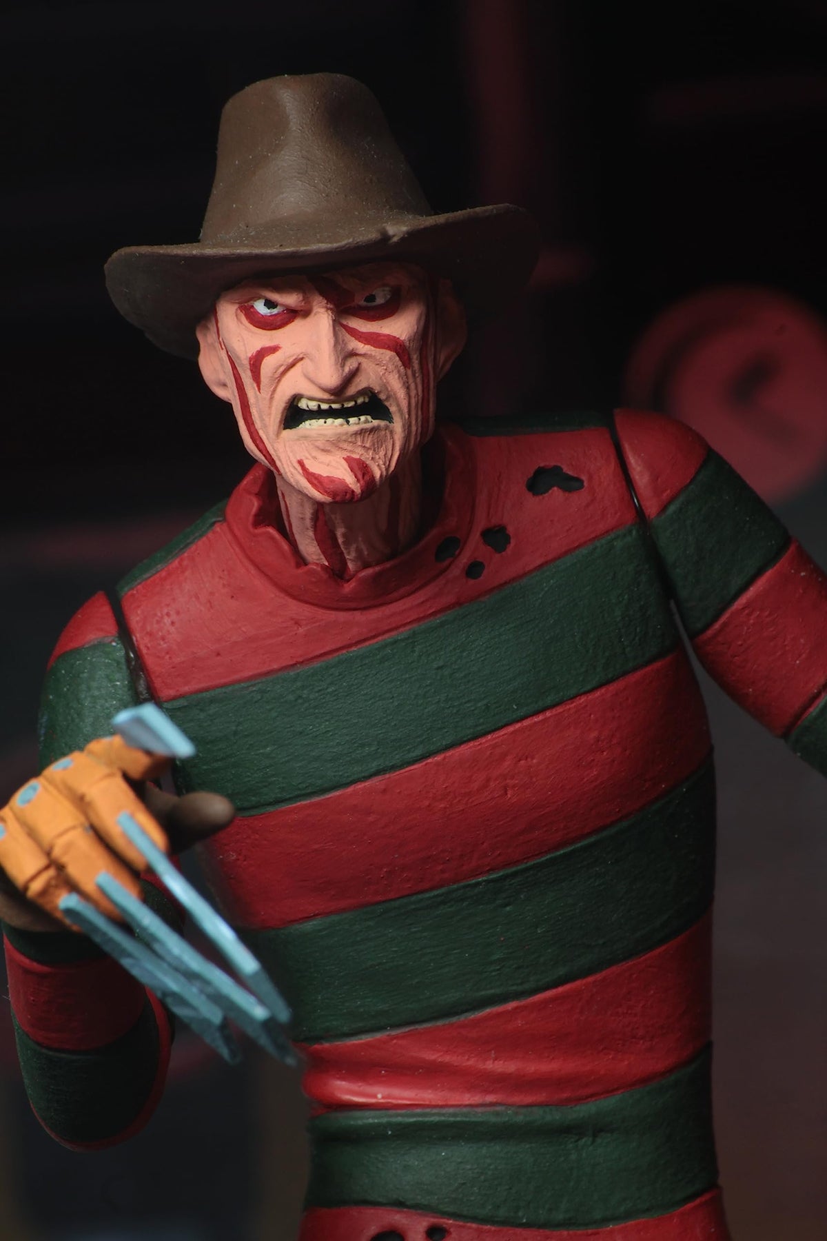 NECA Toony Terrors Freddy Krueger shown on a shelf-ready display.