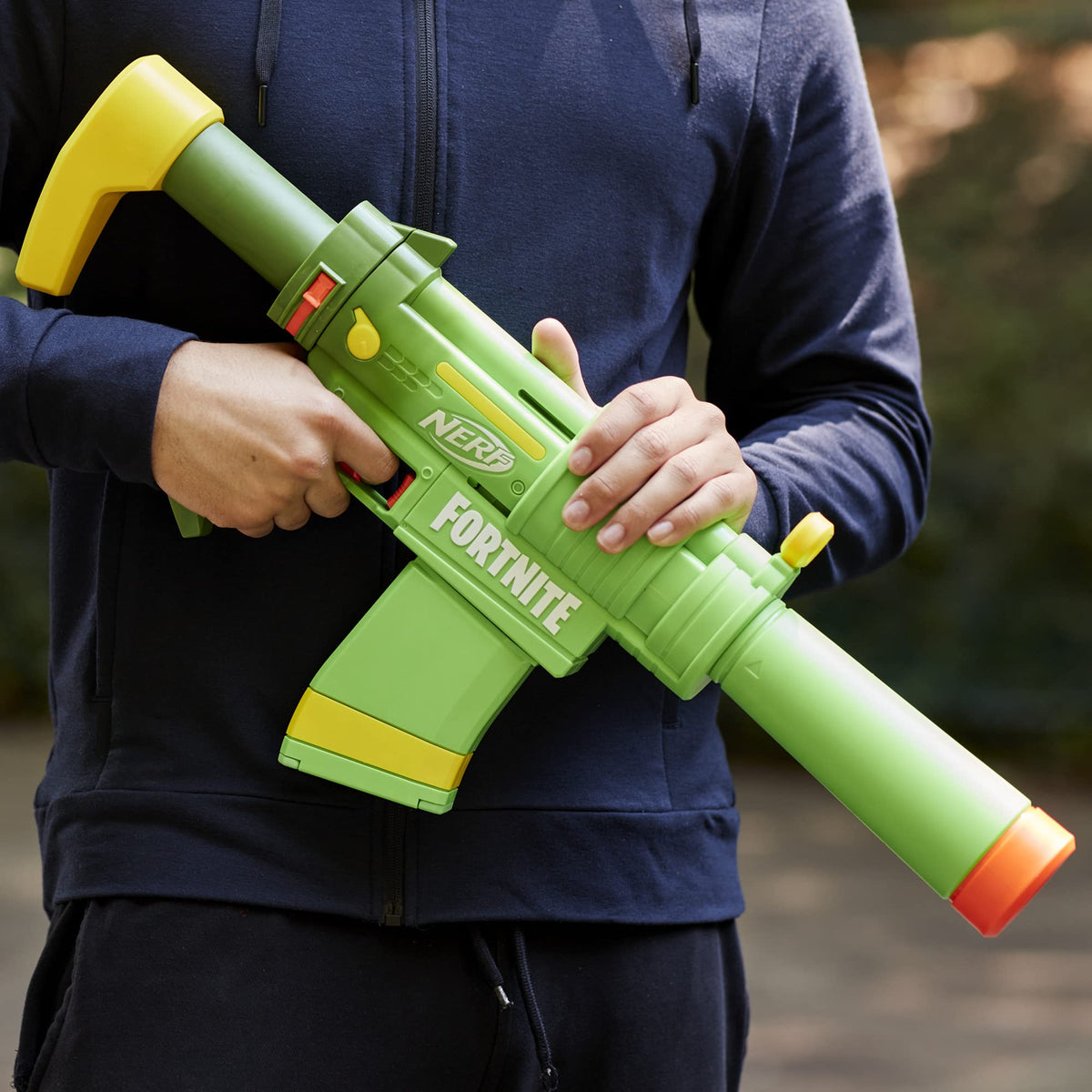 Nerf Fortnite SMG-Zesty held in hand for gameplay realism