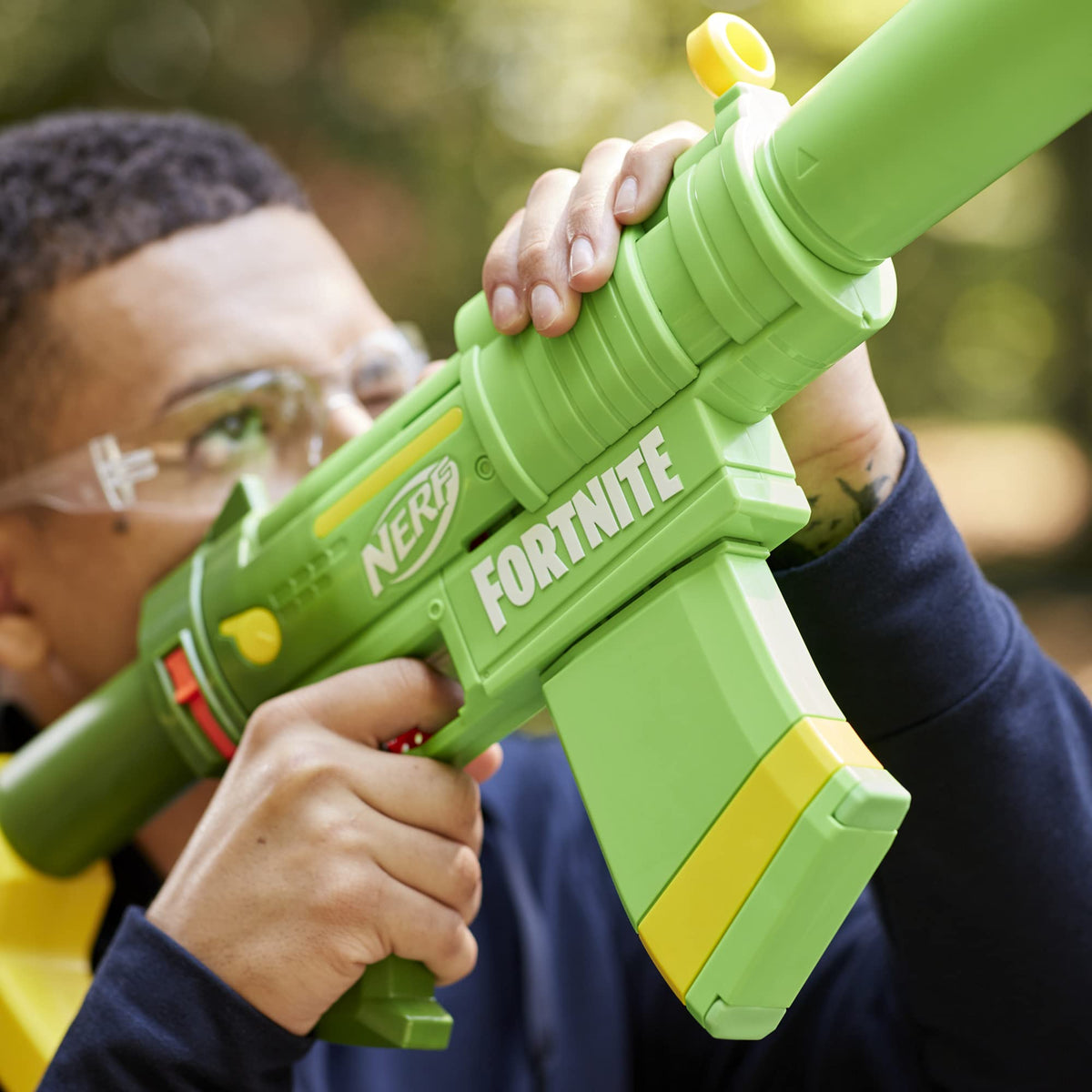 Nerf Fortnite SMG-Zesty prime-action moment showing pump-action firing