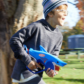 NERF Junior Wild Sharkfire portable blaster fits in a backpack for quick missions