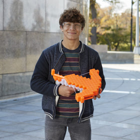 Nerf Minecraft Pillager's Crossbow firing motion during a mock battle.