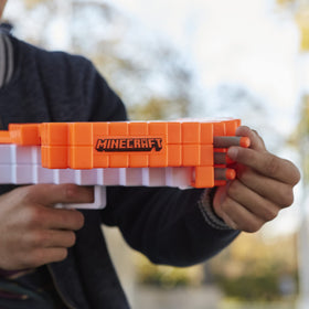 Nerf Minecraft Pillager's Crossbow loaded with three darts ready to fire.