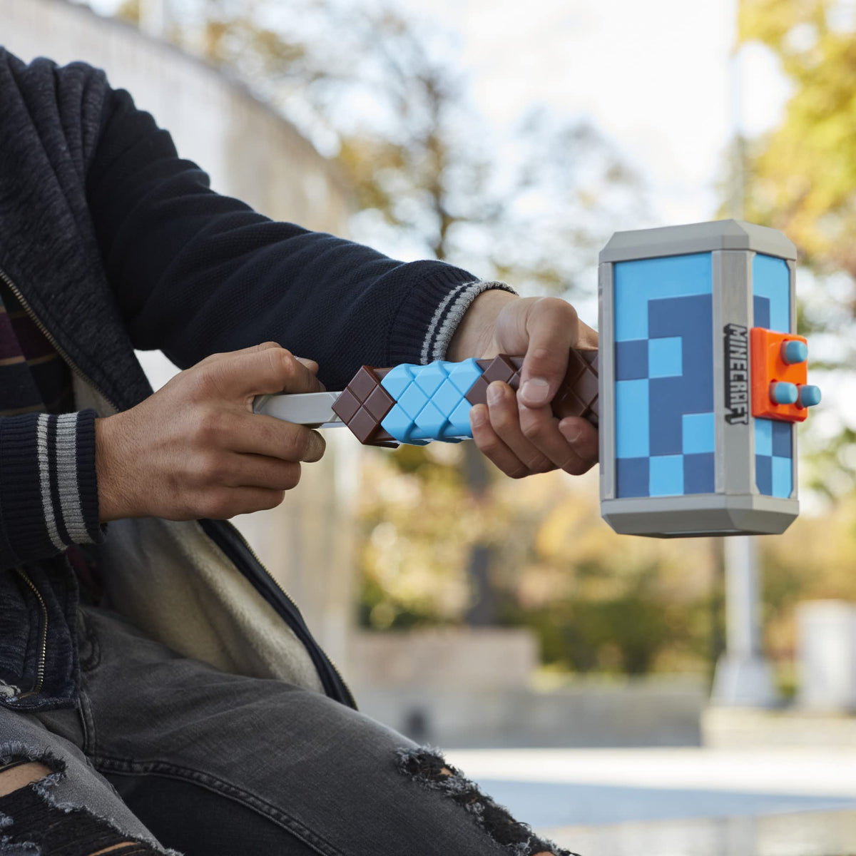 Nerf Minecraft Stormlander Hammer firing a single dart in action.