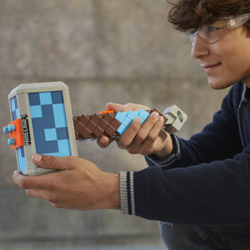 Nerf Minecraft Stormlander Hammer priming handle ready for blasting.