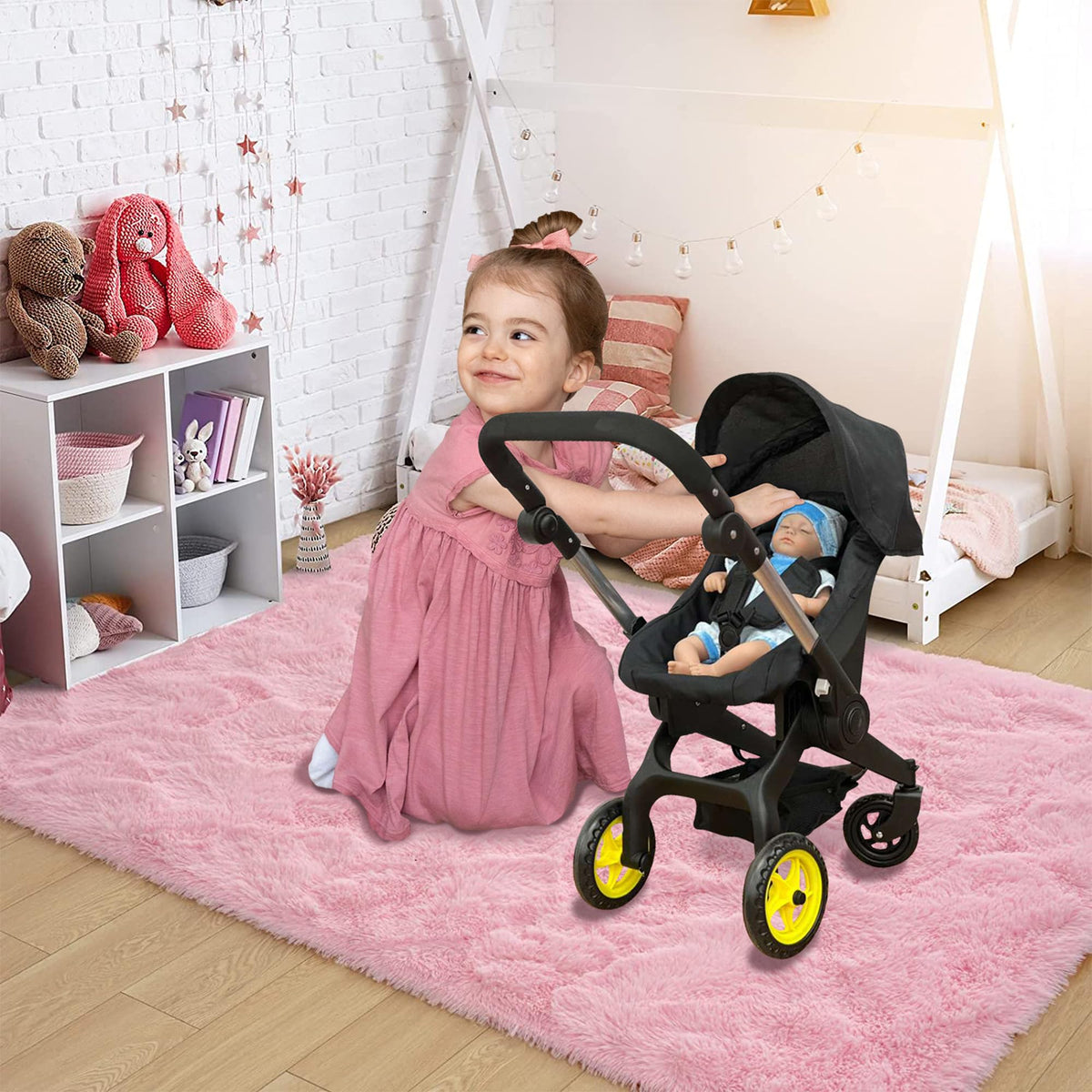 The New York Doll Collection doll stroller features detachable car-seat for varied pretend play.