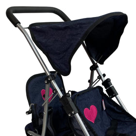 Secure harness and non-slip grip keep dolls safely in place