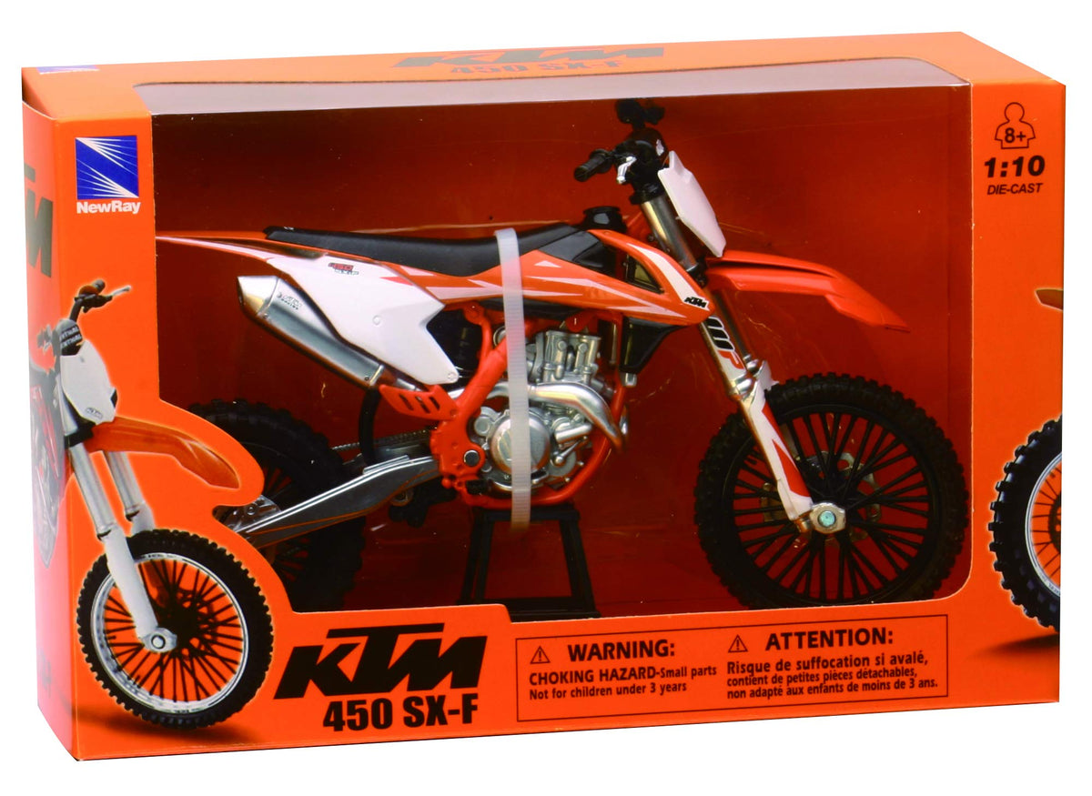 NewRay KTM 450 SXF dirt bike side detail highlighting accurate trim and decals.