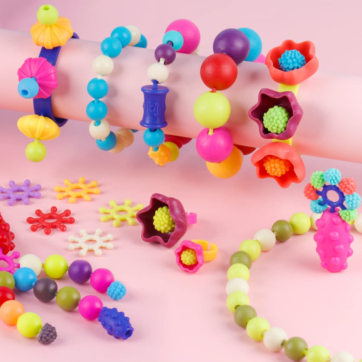 NEXBOX ring-design close-up capturing kids enjoying shape matching while crafting.