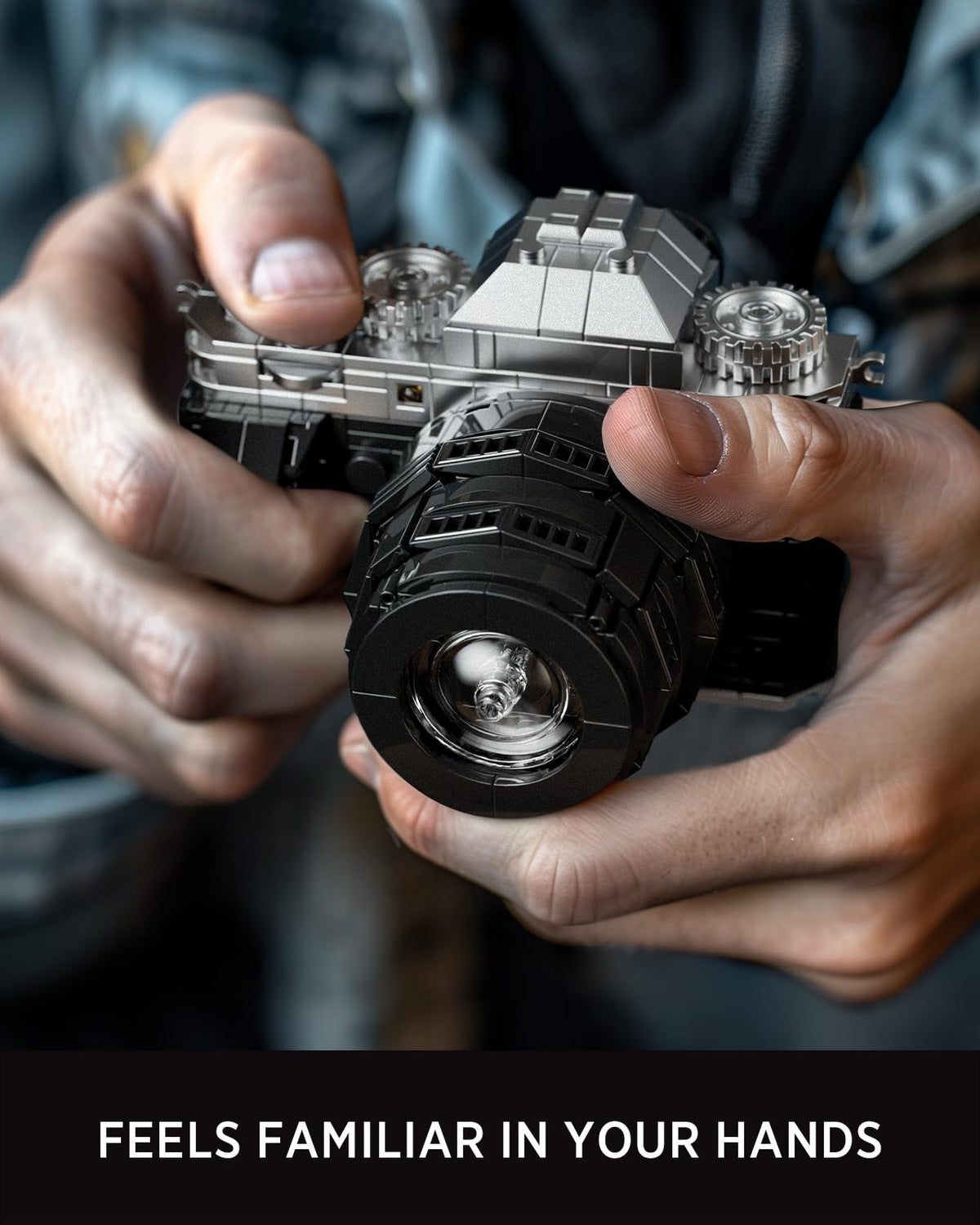 Nifeliz camera-model close-up showing grip and lens for tactile realism.